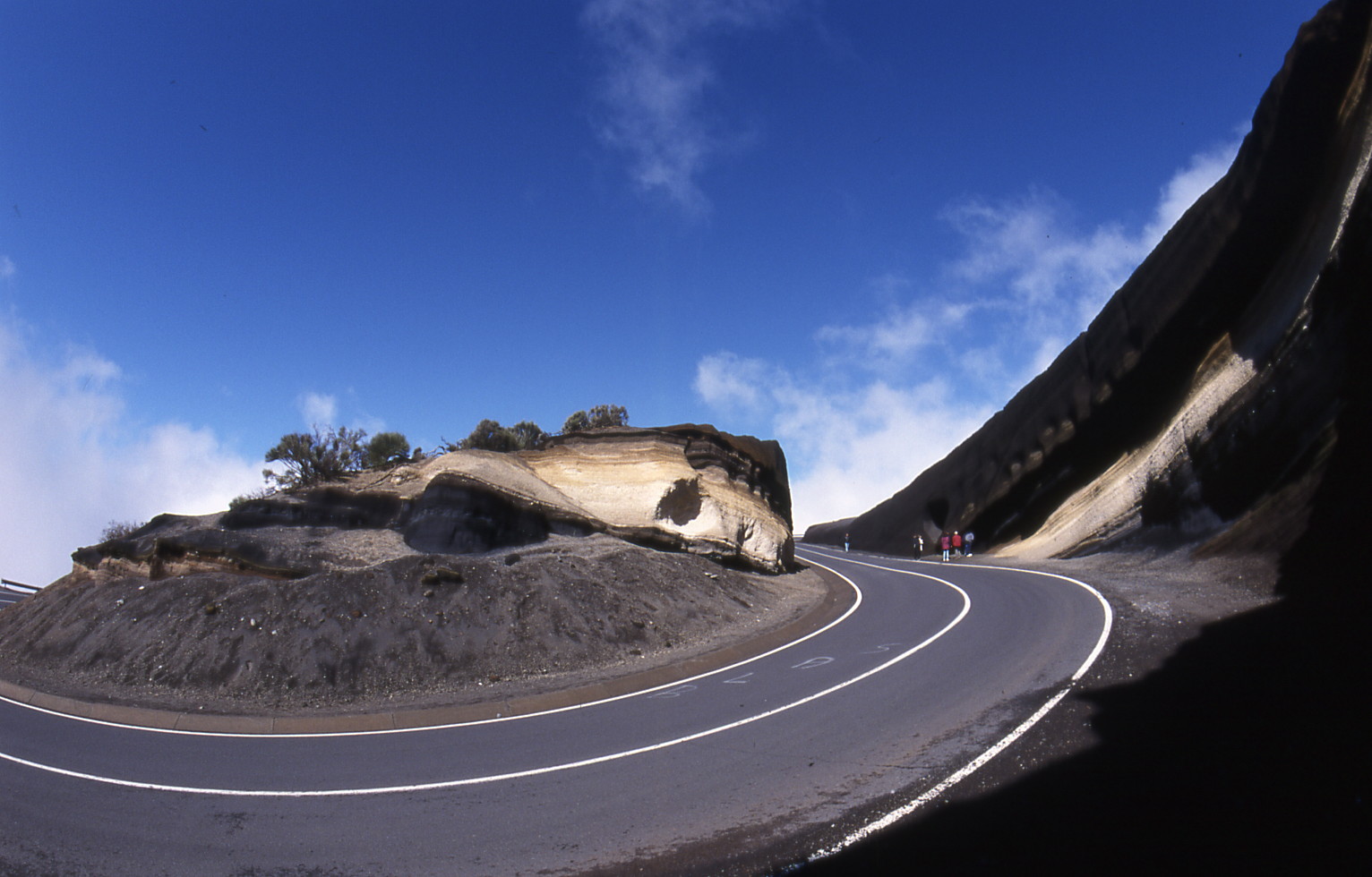 Ash from the Teide cutted by the road